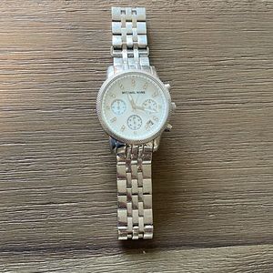 Micheal Kors woman’s silver watch